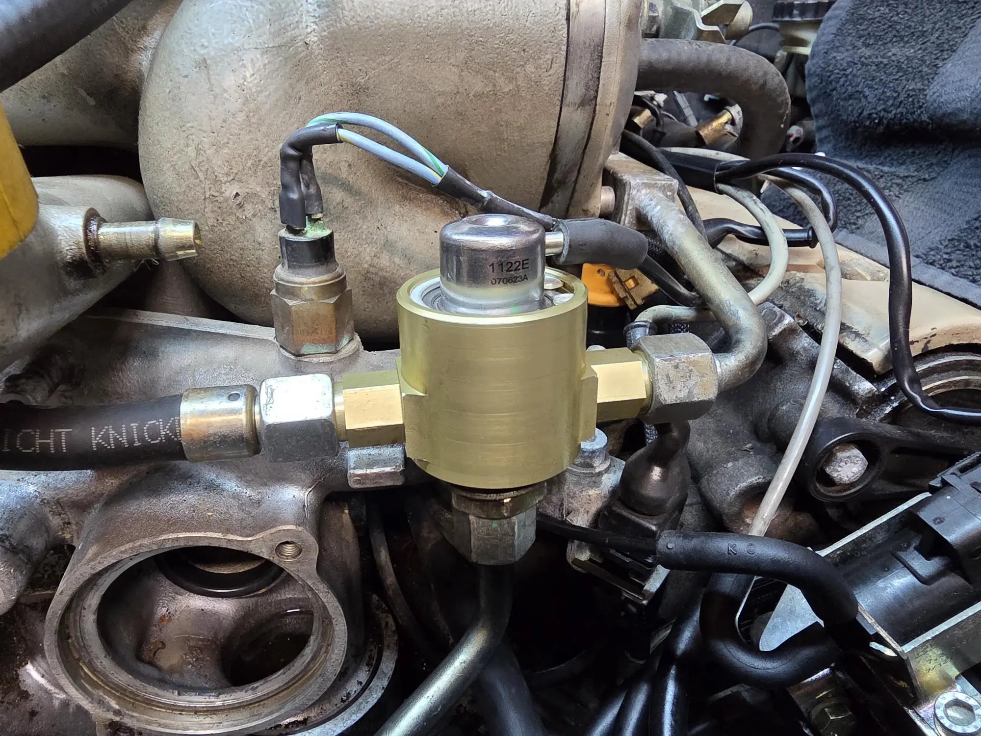 928 110 202 22AM - Billet Front Fuel Pressure Damper - Gold Finish