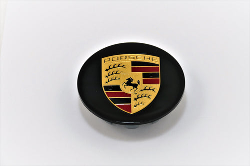 A gloss black painted crest for Porsche 928s. 