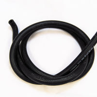 A special molded black hose with a 90 degree bend were it attaches to the nipple on the left side of the radiator.