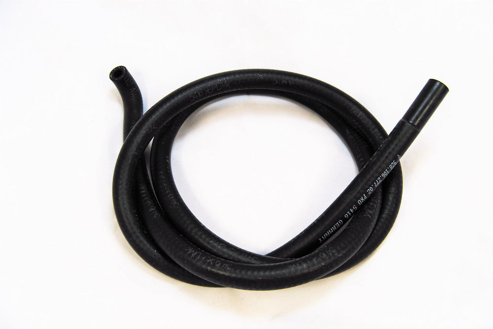 A special molded black hose with a 90 degree bend were it attaches to the nipple on the left side of the radiator.