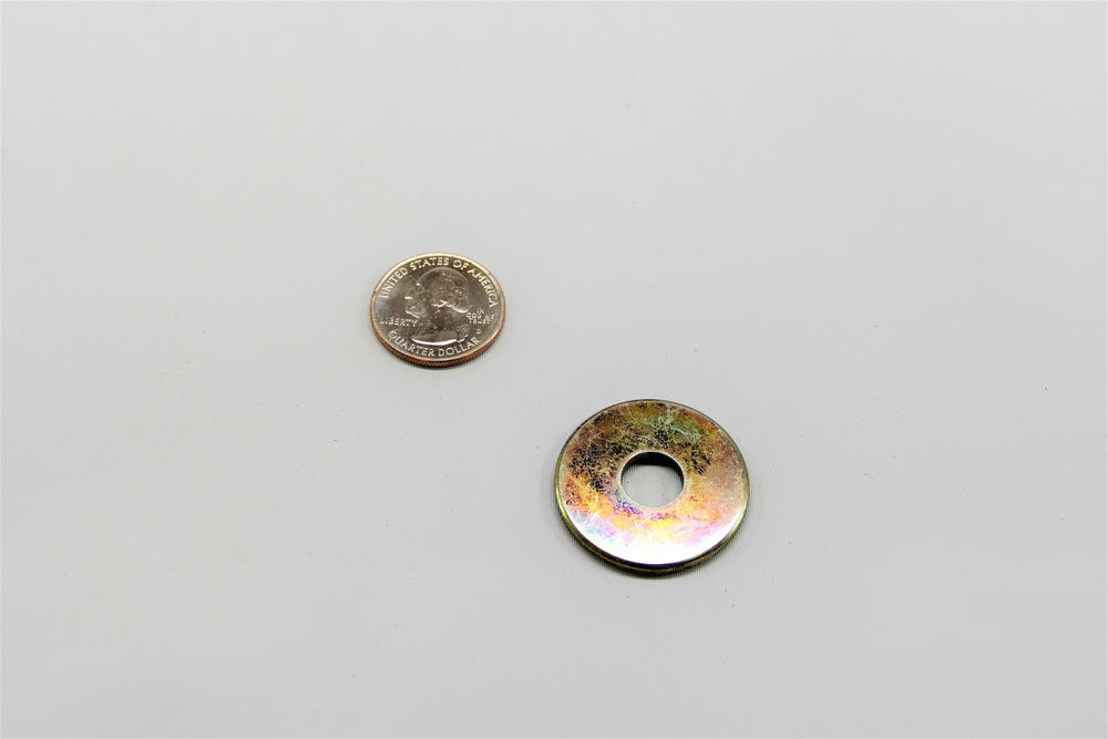 A washer about the size of a quarter for Porsche 928s.